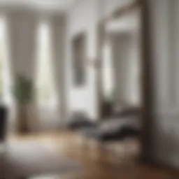 Elegant interior featuring a tall leaning mirror against a stylish wall