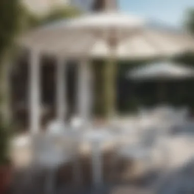 Stylish Outdoor Dining Space Stylish outdoor dining area with white umbrellas