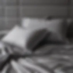 Elegant gray queen bed sheets draped on a luxurious bed